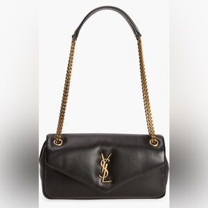 Yves Saint Laurent Elegant Black Bag with Gold Accents
